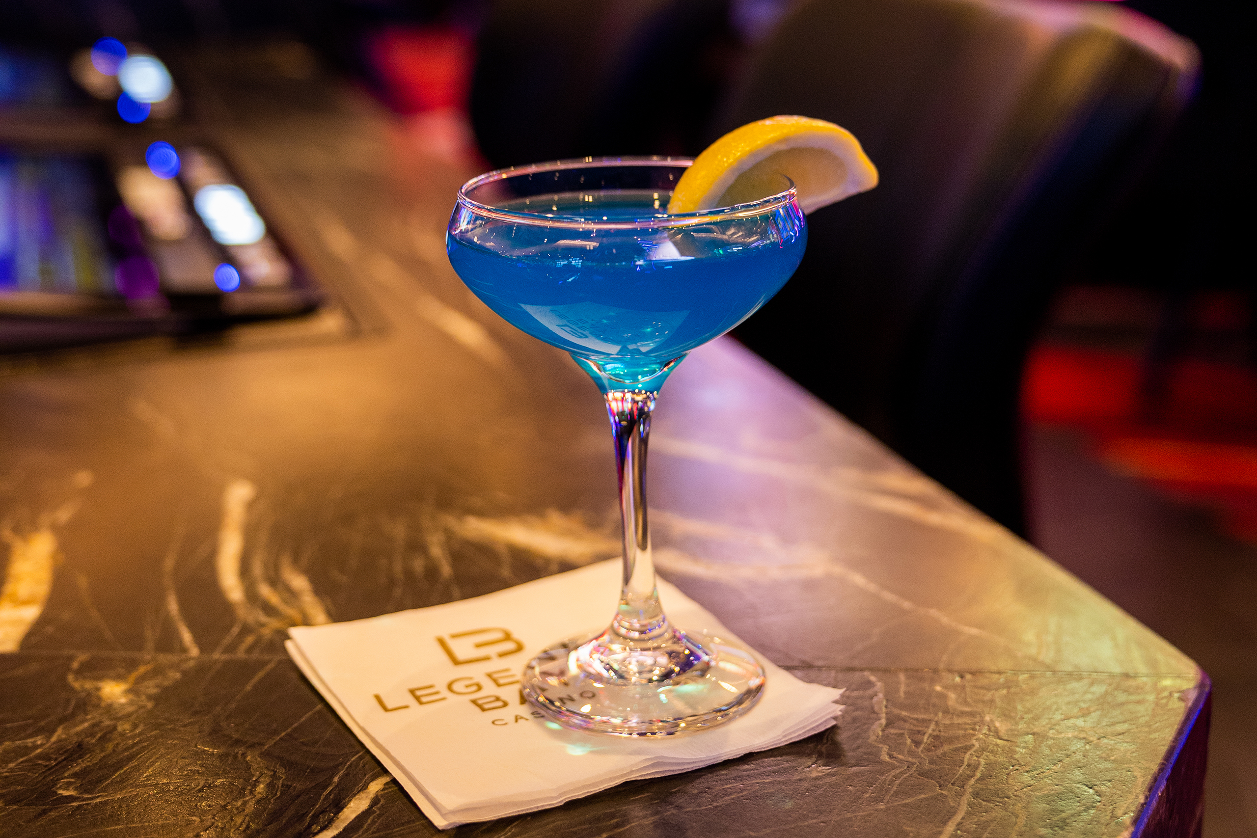 Wolfpack Blue cocktail in coup glass at legends bay casino sportsbook